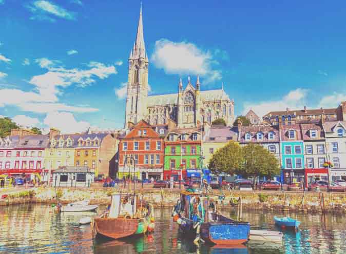 September 2017. Cork, Ireland. Fishing boats inside the port of Cobh. A city with colorful houses in Ireland.