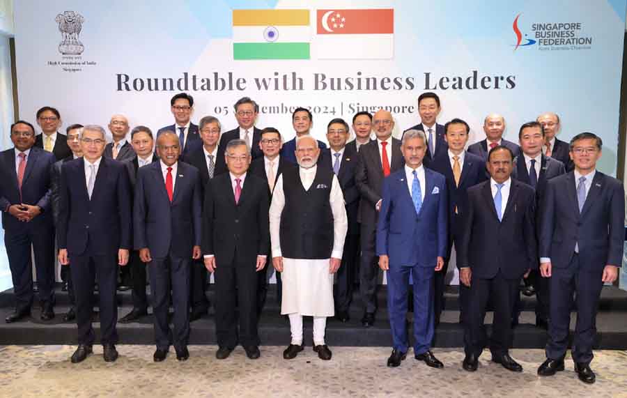 H20240905165627 PM in a group photograph with top business leaders and CEOs, in Singapore on September 05, 2024.
