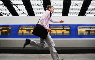 businessman-running-catch-train-260nw-494785069