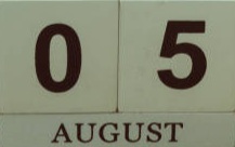 August 05, date on the calendar. Handmade wood cube with date month and day. planning for the day. artistic coloring. selective focus.